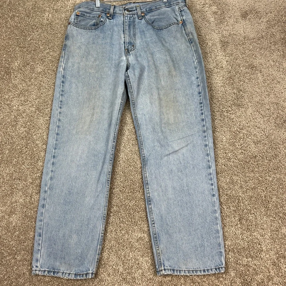 Levis 550 Jeans Mens 34x30 Light Wash Blue Straight Leg 5 Pocket Distressed FLAW